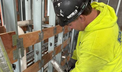 A technician installing Thermobreak.